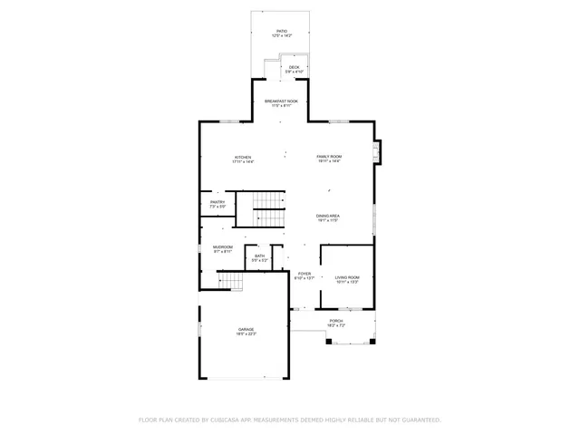 a picture of a bench in front of a wall