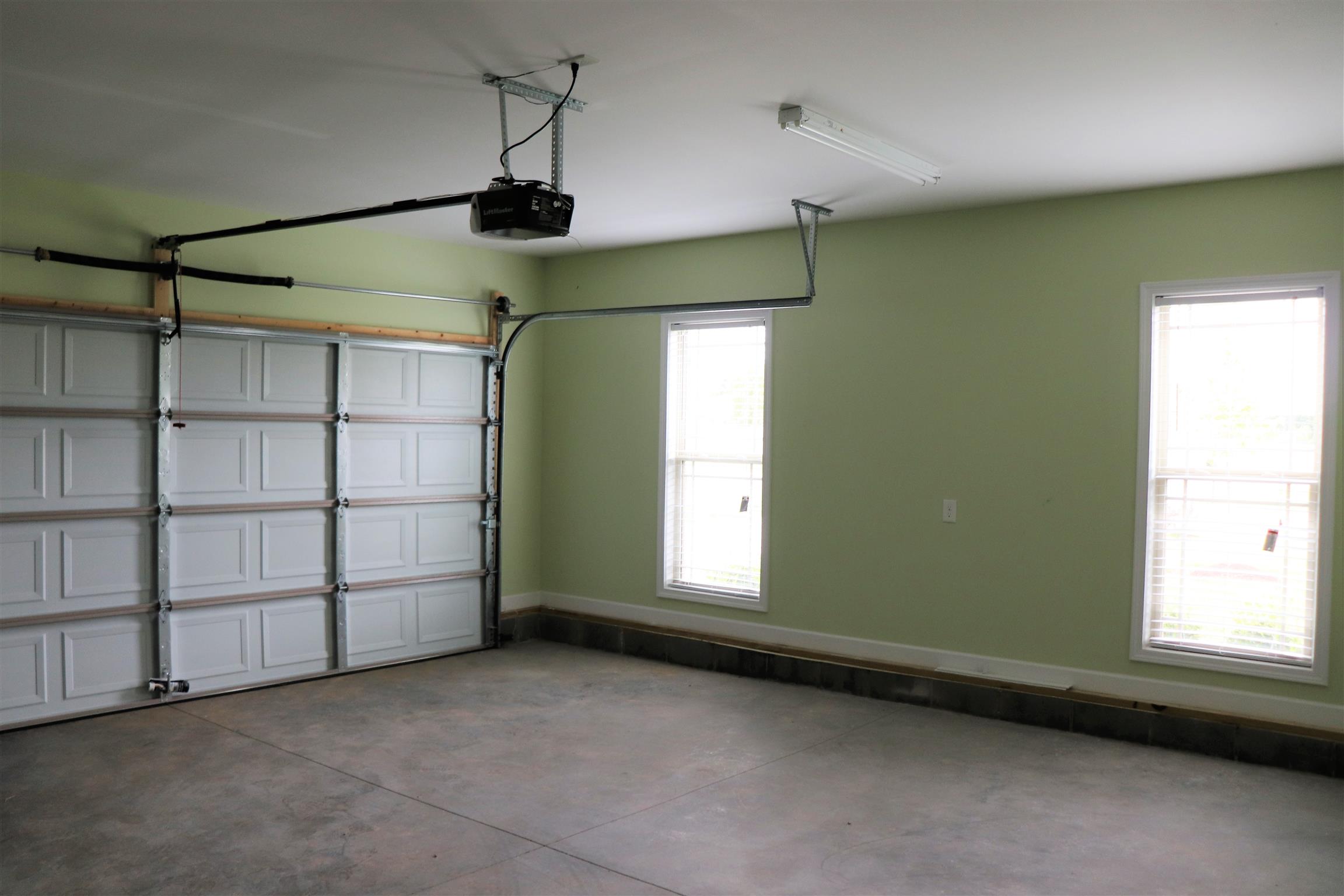 209 Amazonway Ridge Lascassas, TN 37085 - Photo 26 of 27 The Attached 2 Car Garage is OVER Sized, which is always nice to discover!