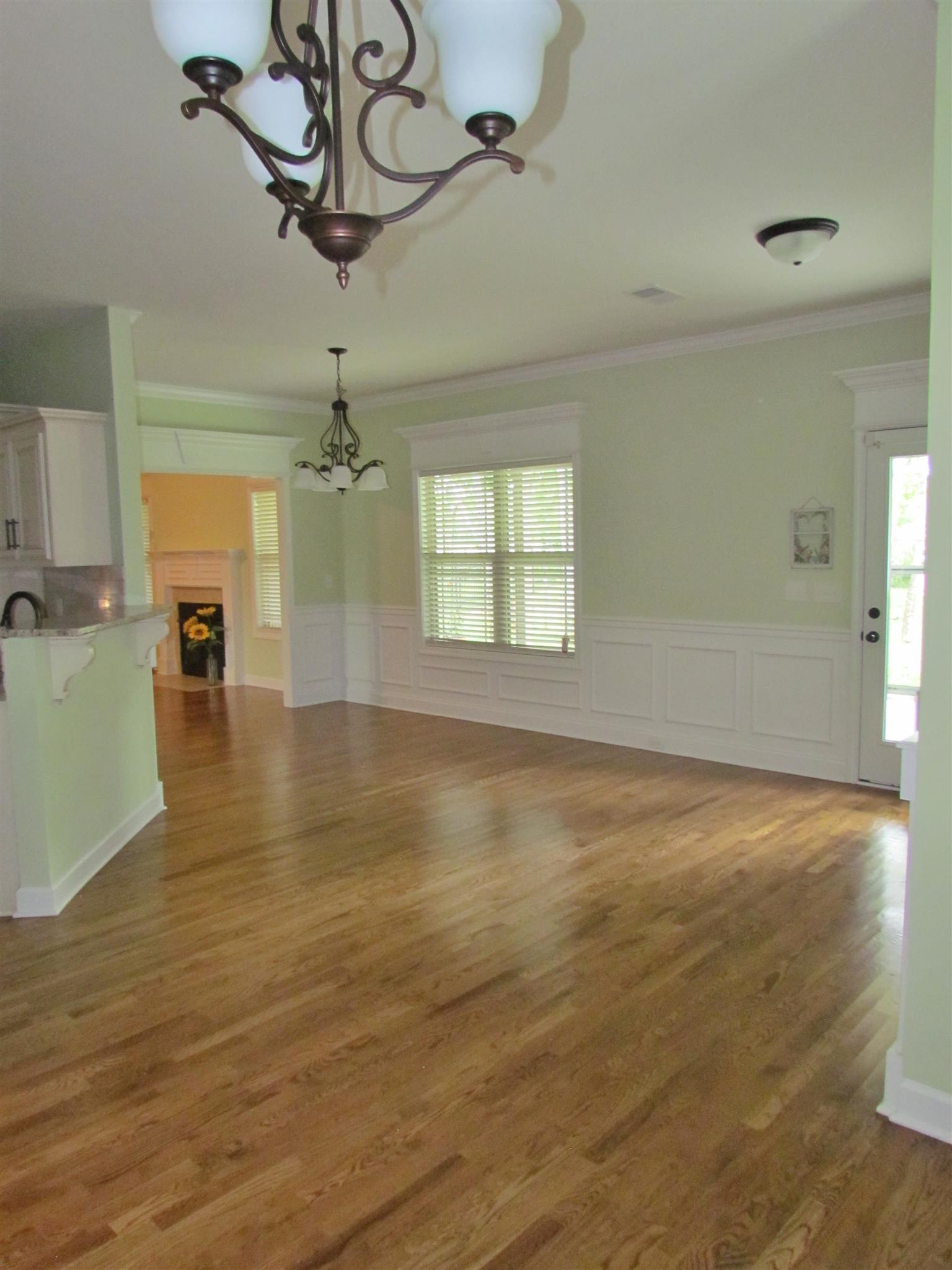 209 Amazonway Ridge Lascassas, TN 37085 - Photo 9 of 27 Another view toward the back door and with windows across the back you have a room with an EXCEPTIONAL view!