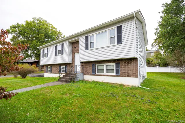 a house view with a garden space