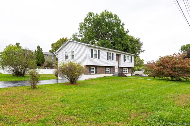 a view of deck with table and chairs and wooden floor
