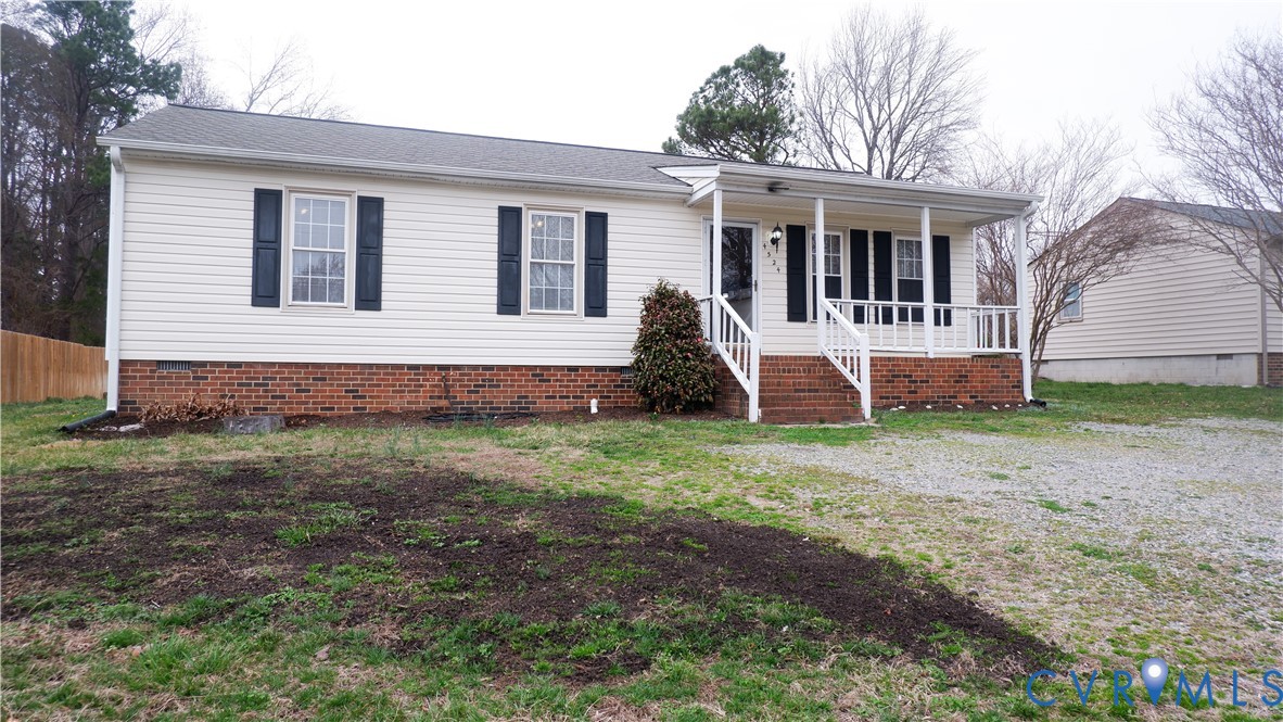 4524 Twelveoaks Road Midlothian, VA 23112 - Photo 1 of 12 a front view of a house with garden