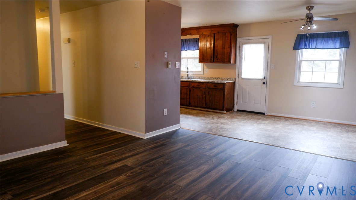 4524 Twelveoaks Road Midlothian, VA 23112 - Photo 3 of 12 an empty room with wooden floor and windows