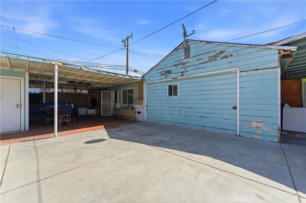 121 East 68th Way Long Beach, CA 90805 - Photo 17 of 17 a view of a house with a garage