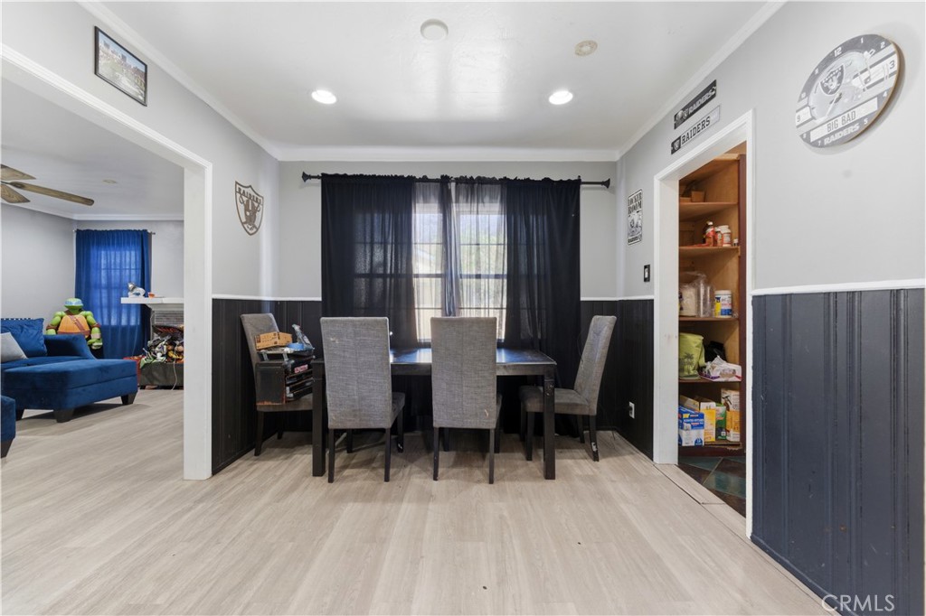 121 East 68th Way Long Beach, CA 90805 - Photo 5 of 17 a view of a dining room with furniture