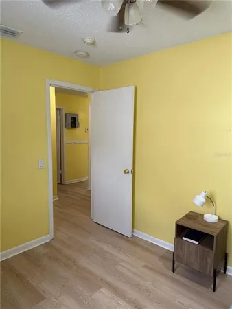 a view of a livingroom with wooden floor