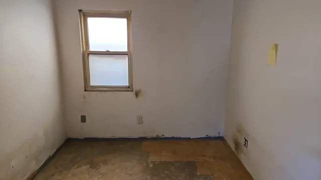 an empty room with a window