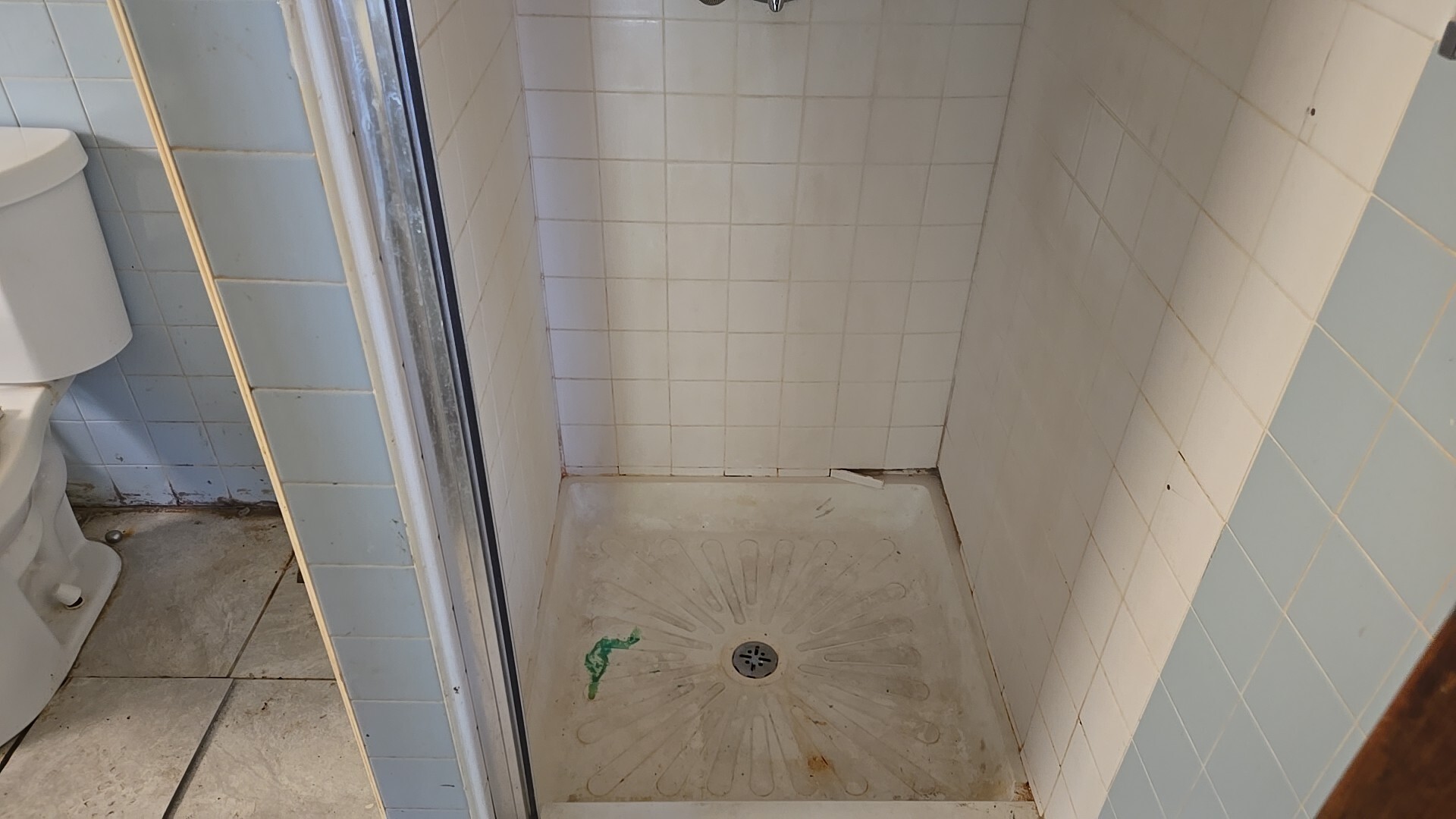 612 East 90th Street Chicago, IL 60619 - Photo 16 of 22 a bathroom with a sink and toilet