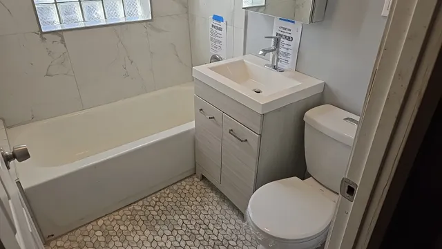 a bathroom with a sink and a toilet