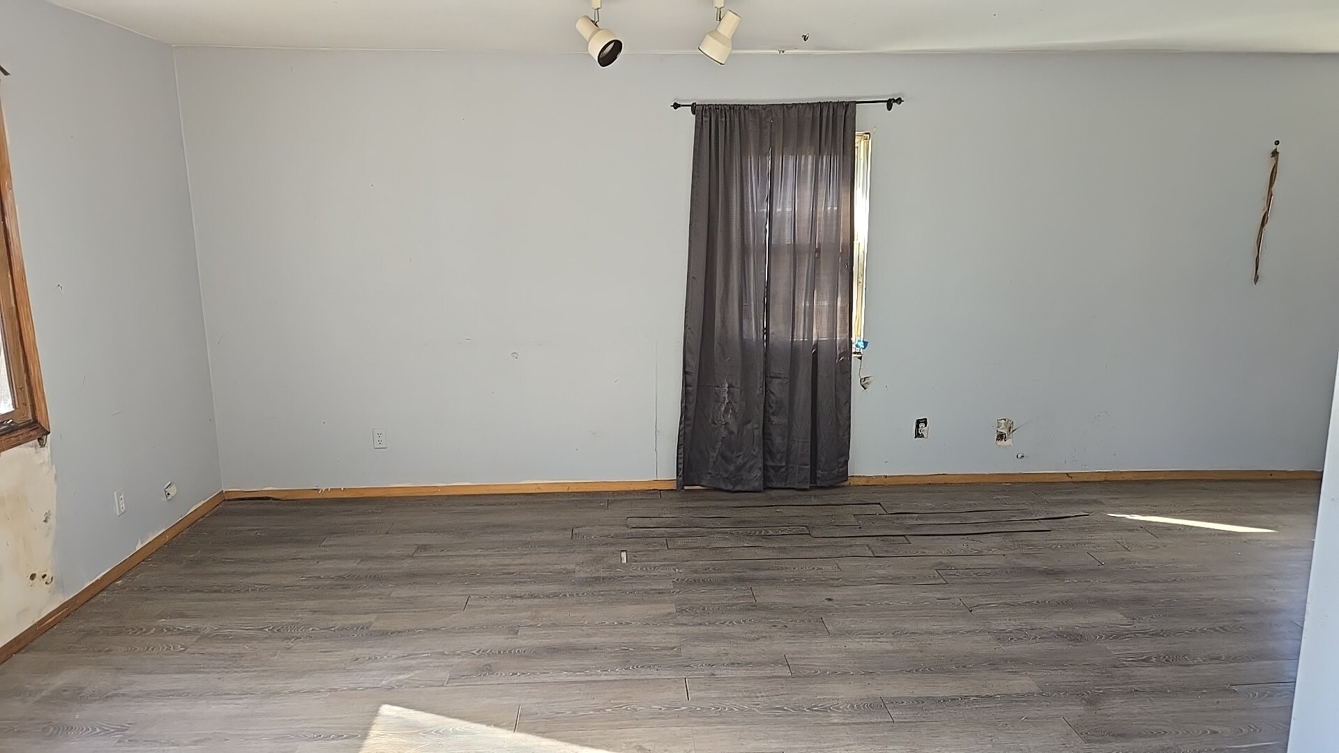612 East 90th Street Chicago, IL 60619 - Photo 10 of 22 a view of an empty room with wooden floor
