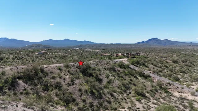 a view of mountains and valleys