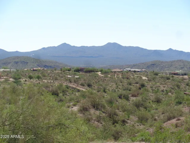 a view of a house with a mountain view
