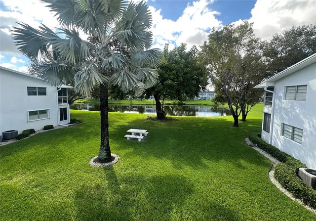 a view of a house with a park