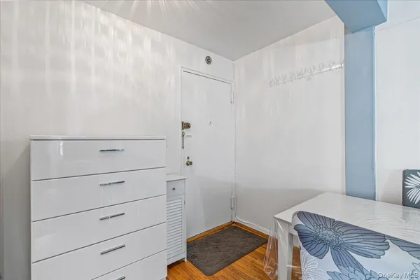 a bedroom with a bed and a cabinets