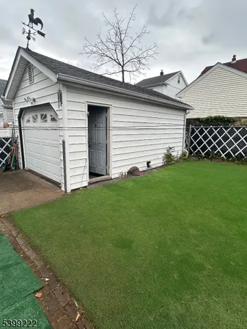 a view of a backyard of the house