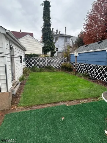 a view of a back yard of the house