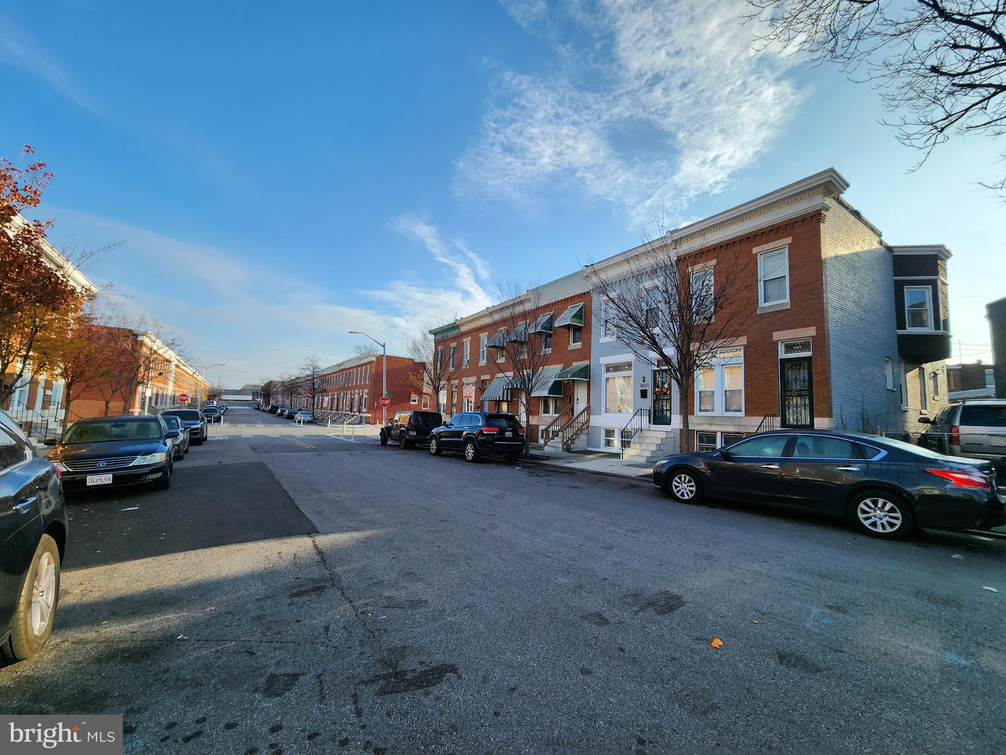 2019 Cecil Avenue Baltimore, MD 21218 - Photo 17 of 17 a car parked in front of a house