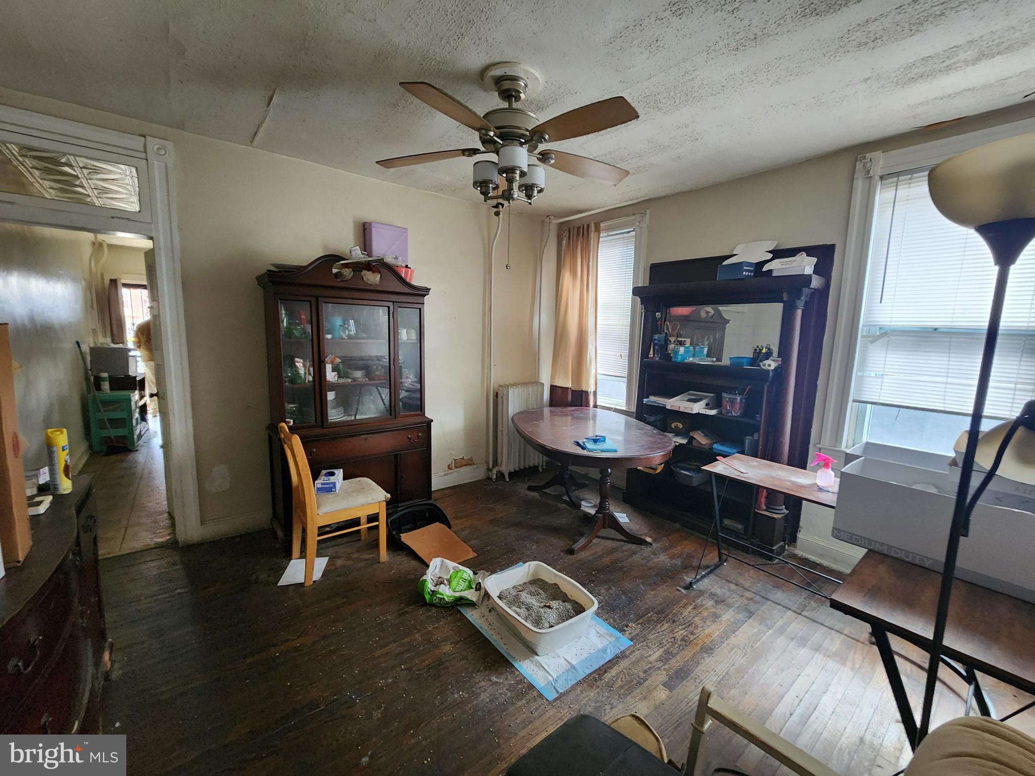 2019 Cecil Avenue Baltimore, MD 21218 - Photo 4 of 17 a living room with furniture and a wooden floor