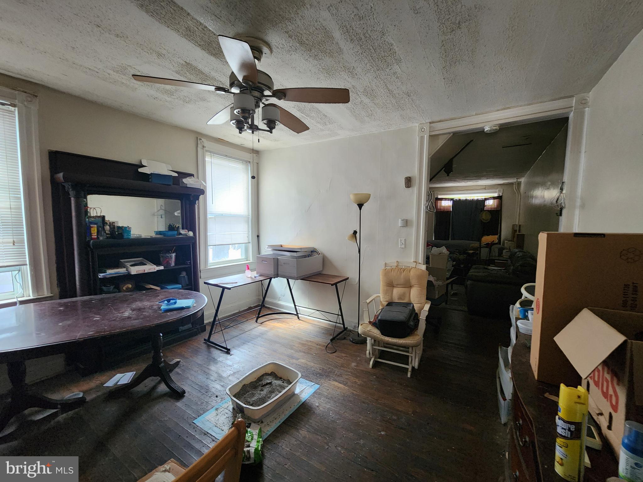 2019 Cecil Avenue Baltimore, MD 21218 - Photo 5 of 17 a living room with furniture a rug and a flat screen tv
