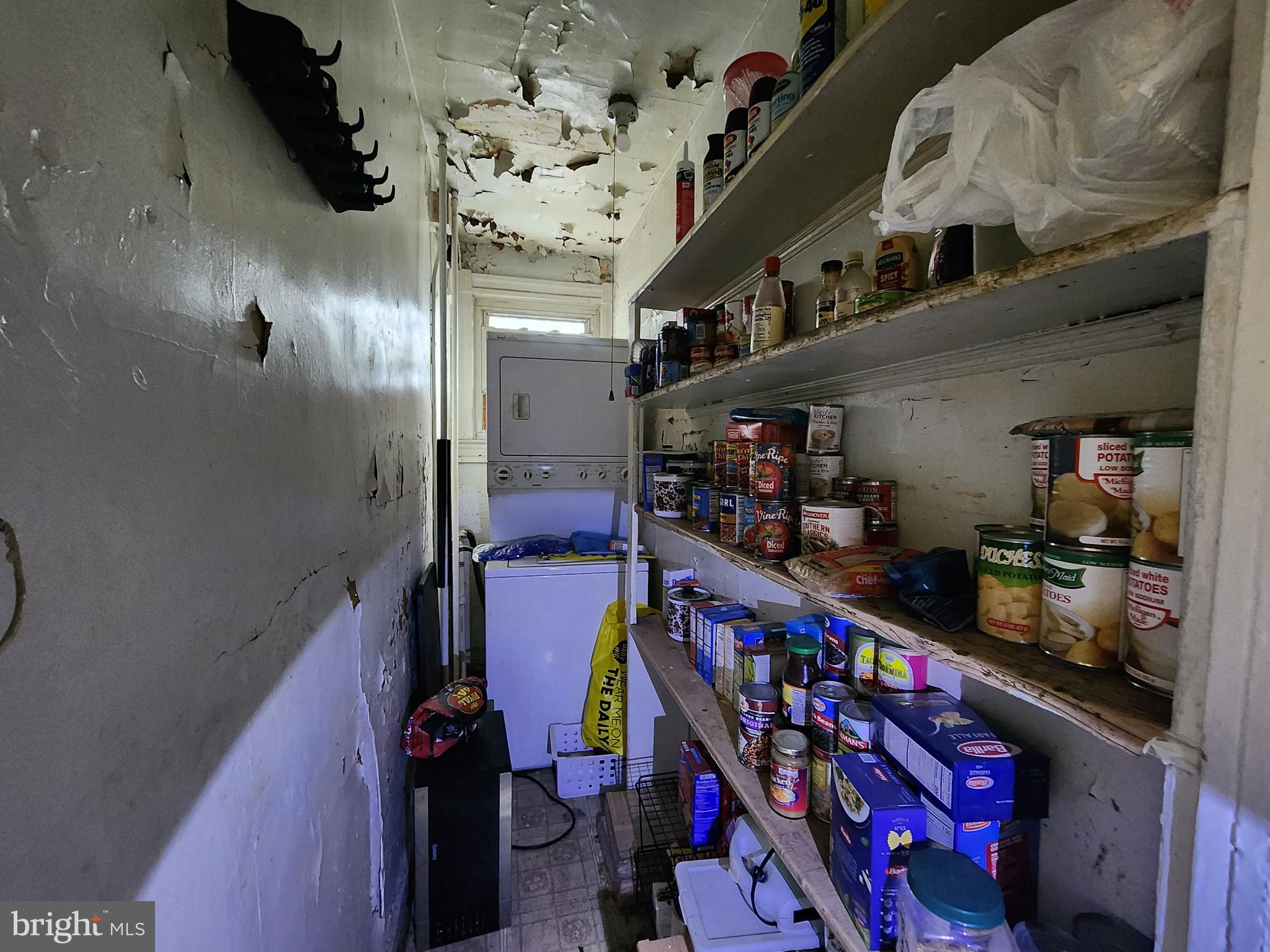 2019 Cecil Avenue Baltimore, MD 21218 - Photo 8 of 17 a room with lots of different colored cloths
