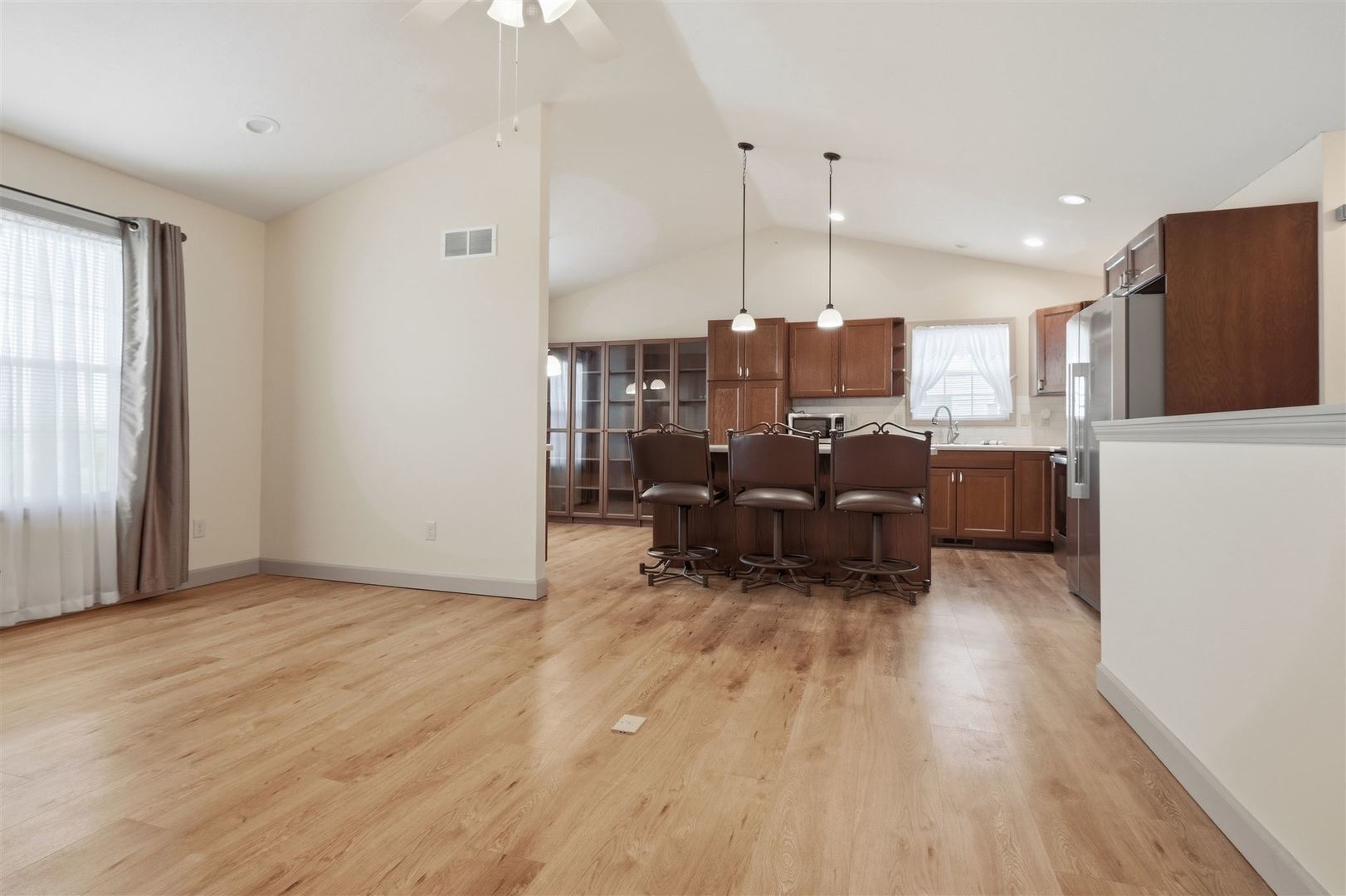 171 Eugene Drive Normal, IL 61761 - Photo 14 of 29 a living room with furniture and a wooden floor