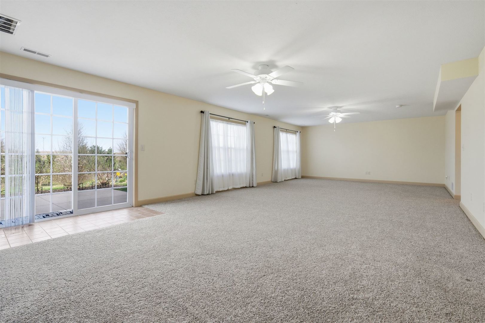 171 Eugene Drive Normal, IL 61761 - Photo 19 of 29 a view of an empty room with a window