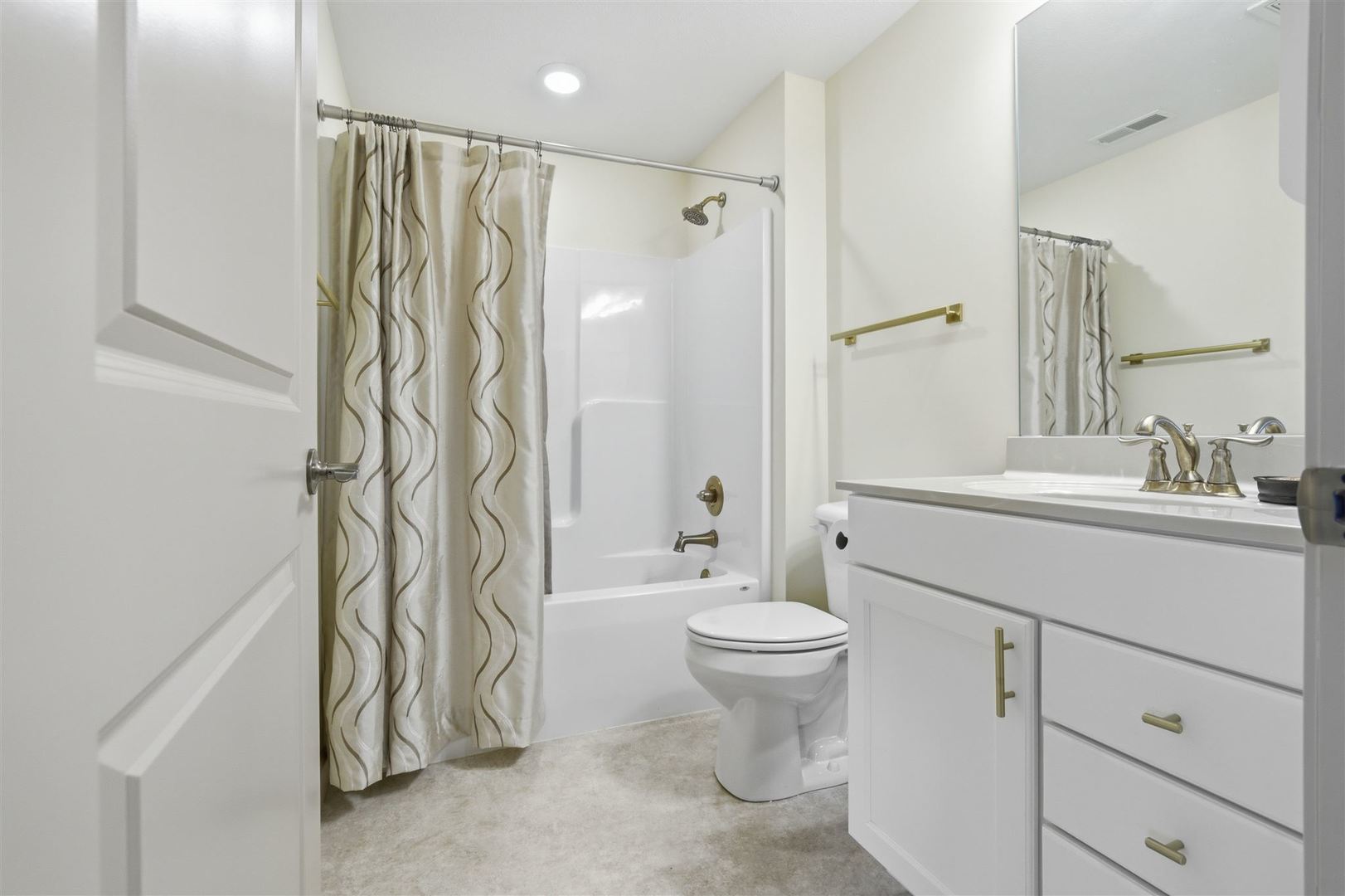 171 Eugene Drive Normal, IL 61761 - Photo 21 of 29 a bathroom with a shower toilet and sink