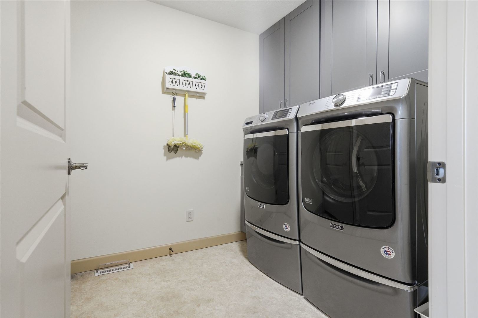 171 Eugene Drive Normal, IL 61761 - Photo 5 of 29 a utility room with dryer and washer