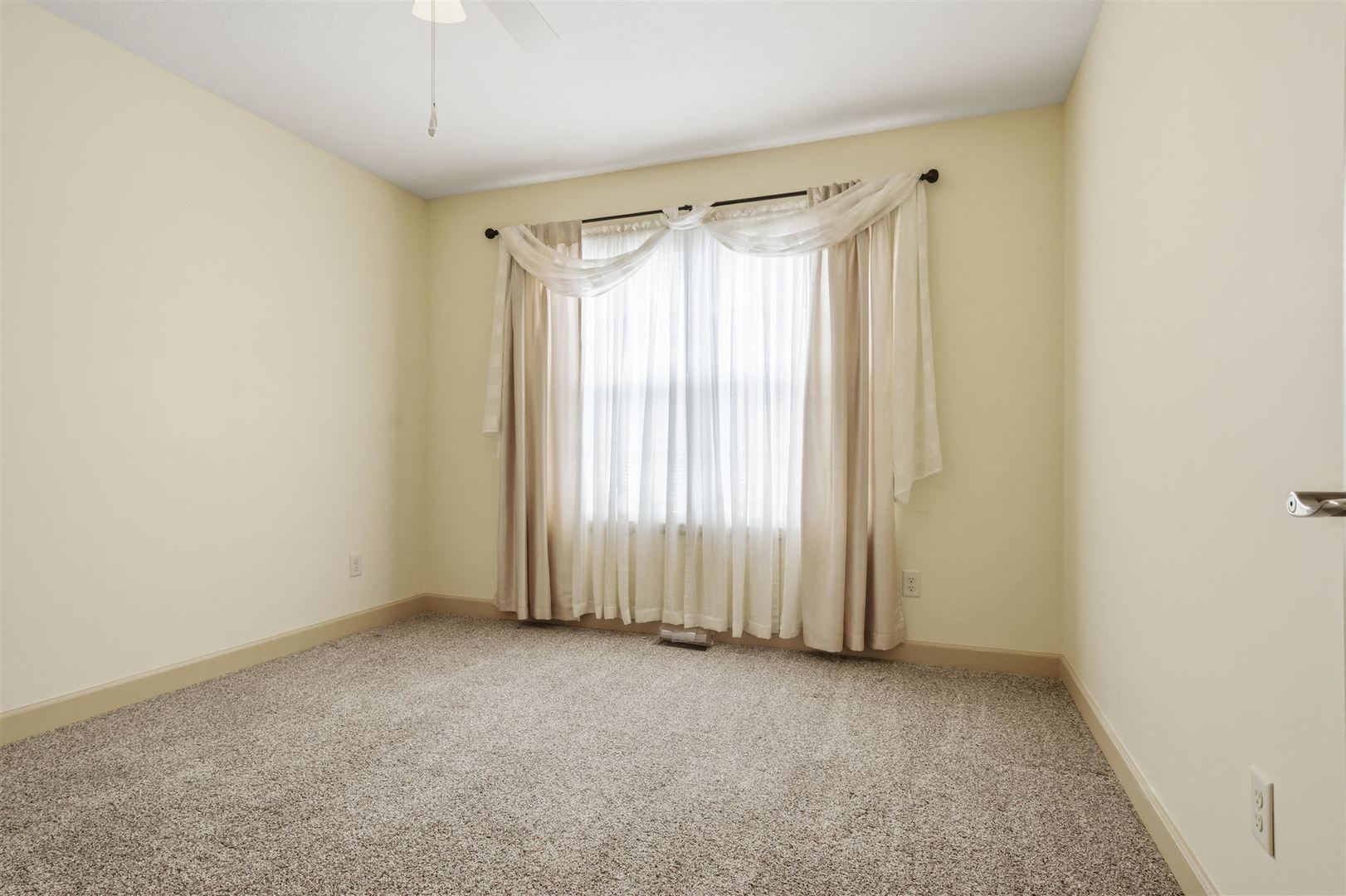 171 Eugene Drive Normal, IL 61761 - Photo 7 of 29 an empty room with a window