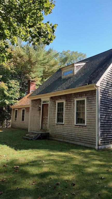 8 Crescent Street Plympton, MA 02367 - Photo 1 of 16 a view of a house with a yard