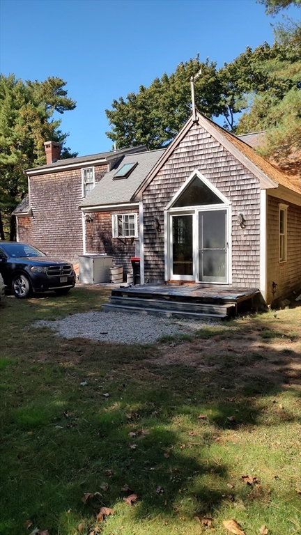 8 Crescent Street Plympton, MA 02367 - Photo 14 of 16 a front view of a house with a yard