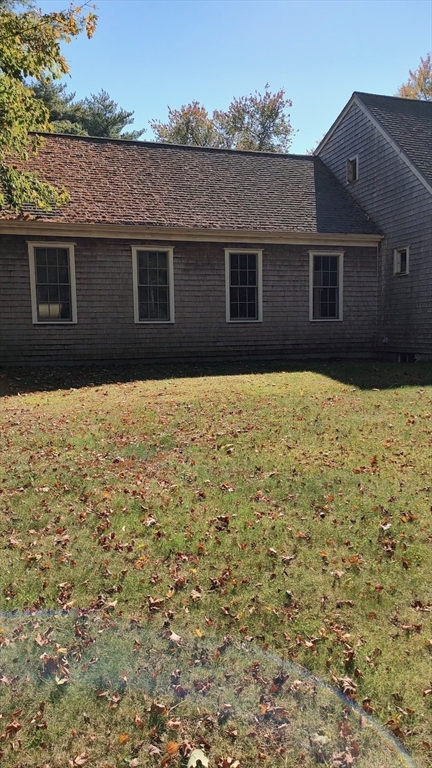 8 Crescent Street Plympton, MA 02367 - Photo 2 of 16 a house that has a tree in front of it