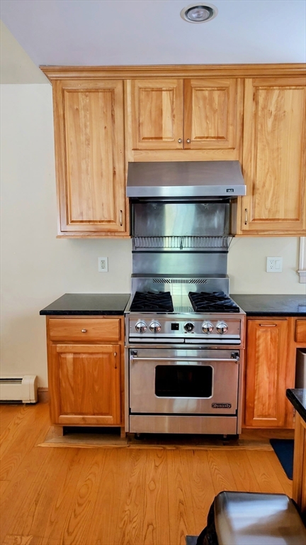 8 Crescent Street Plympton, MA 02367 - Photo 7 of 16 a stove top oven sitting inside of a kitchen