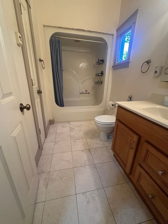 8 Crescent Street Plympton, MA 02367 - Photo 8 of 16 a bathroom with a toilet sink and mirror