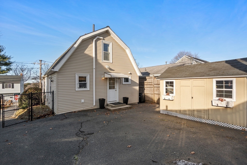 194 College Farm Road Waltham, MA 02451 - Photo 26 of 28 a view of a house with a yard