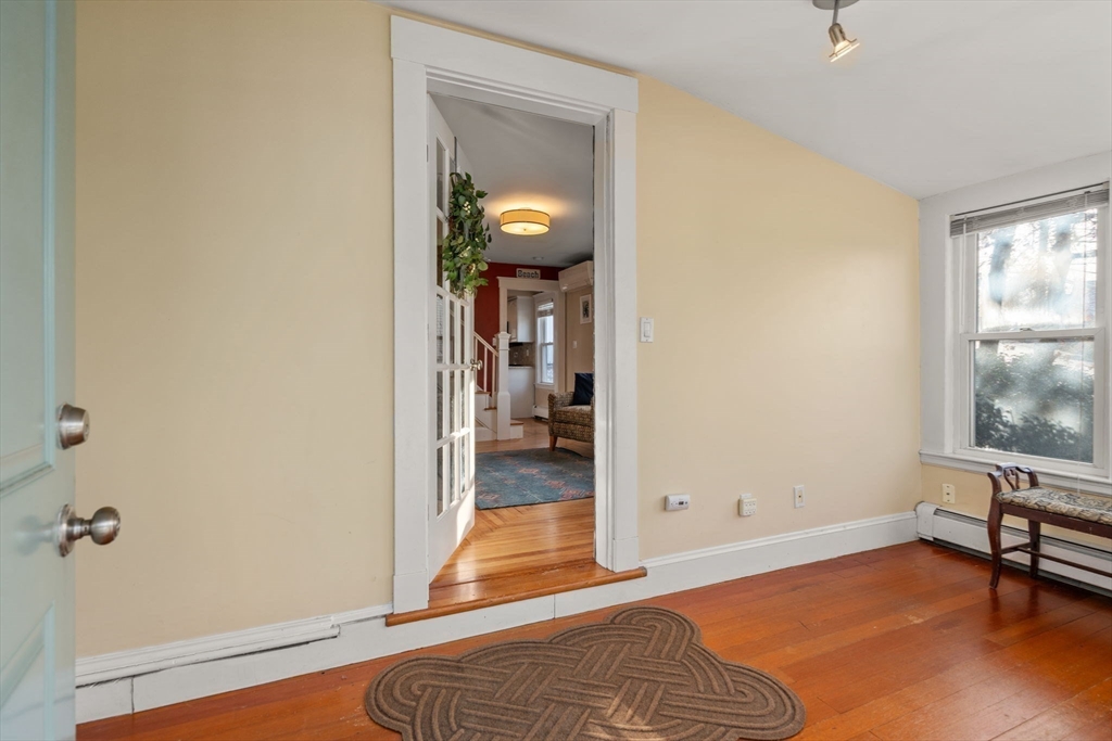 194 College Farm Road Waltham, MA 02451 - Photo 4 of 28 a bedroom with a bed and a window