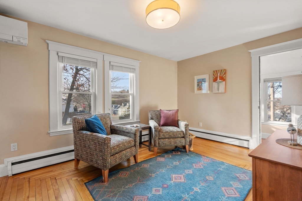 194 College Farm Road Waltham, MA 02451 - Photo 5 of 28 a living room with furniture and a large window