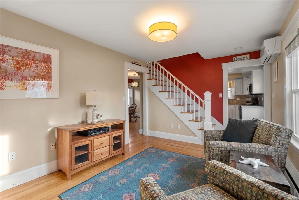 194 College Farm Road Waltham, MA 02451 - Photo 6 of 28 a view of livingroom with furniture and wooden floor