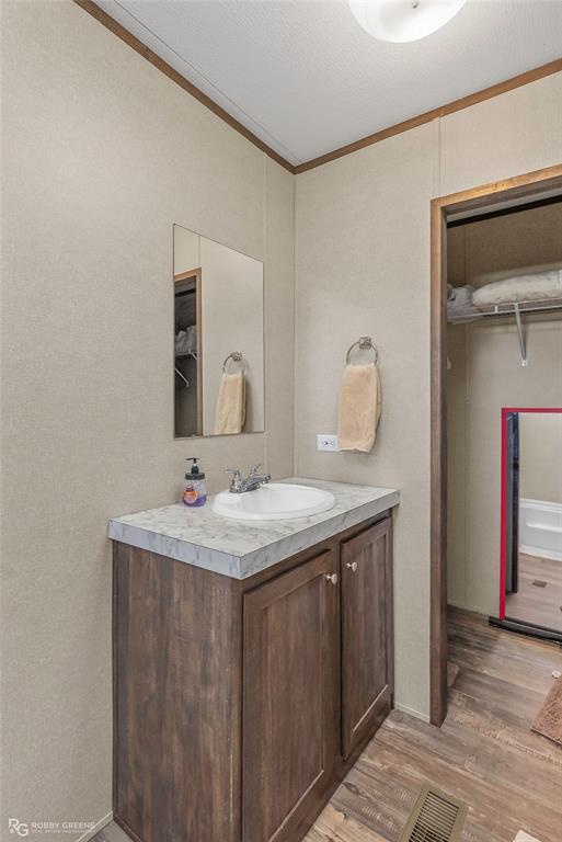 1048 Merritt Mountain Road Many, LA 71449 - Photo 13 of 27 a bathroom with a granite countertop sink and a mirror