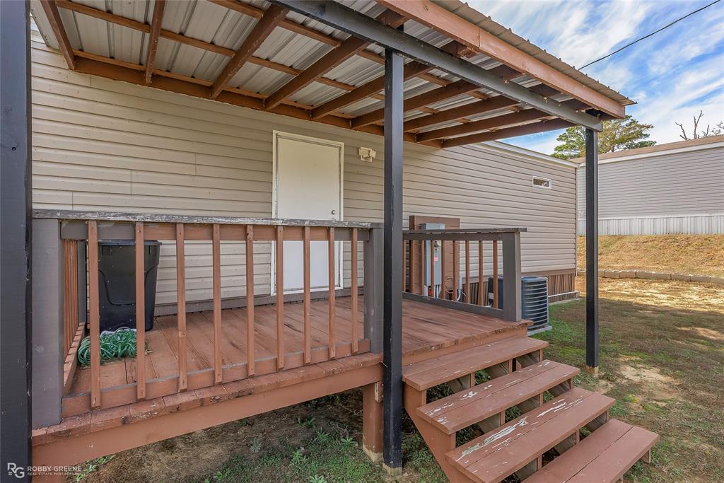 1048 Merritt Mountain Road Many, LA 71449 - Photo 20 of 27 a view of a wooden deck