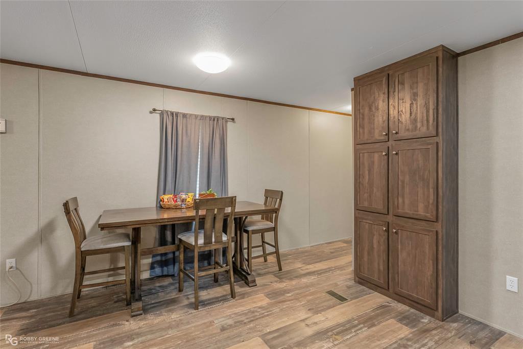 1048 Merritt Mountain Road Many, LA 71449 - Photo 10 of 27 a view of a livingroom with furniture and wooden floor