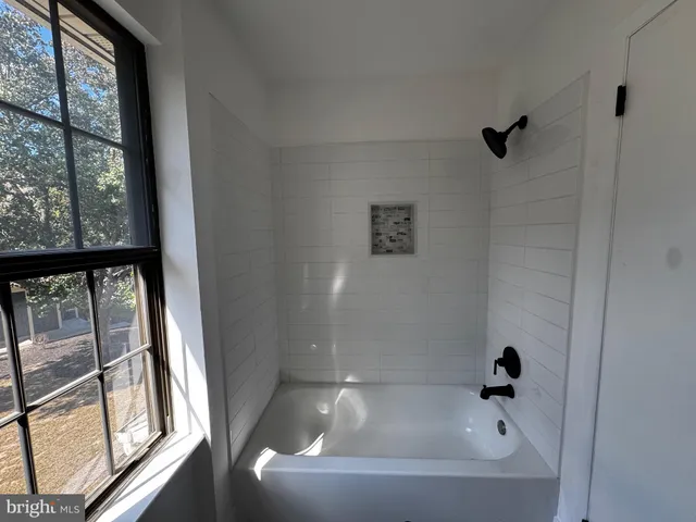 a bathroom with a bathtub