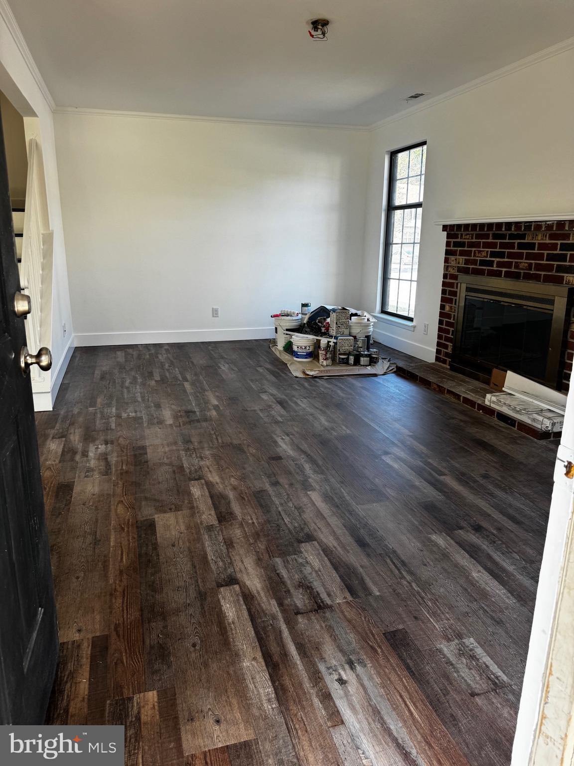 633 Foxton Court Mantua, NJ 08051 - Photo 7 of 14 a view of empty room with wooden floor and fireplace