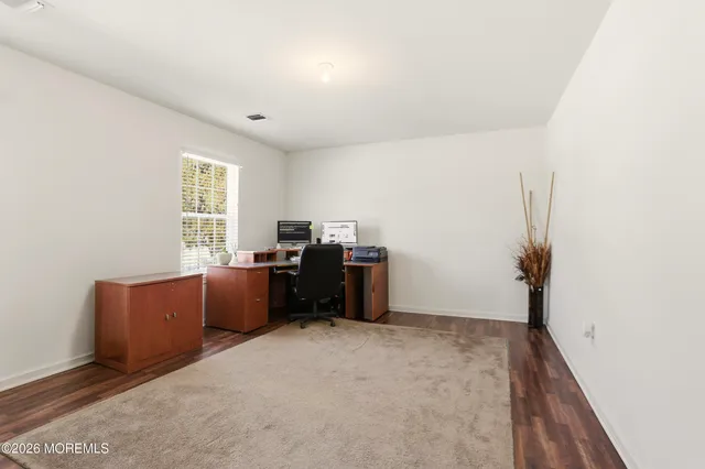 a room with furniture and window