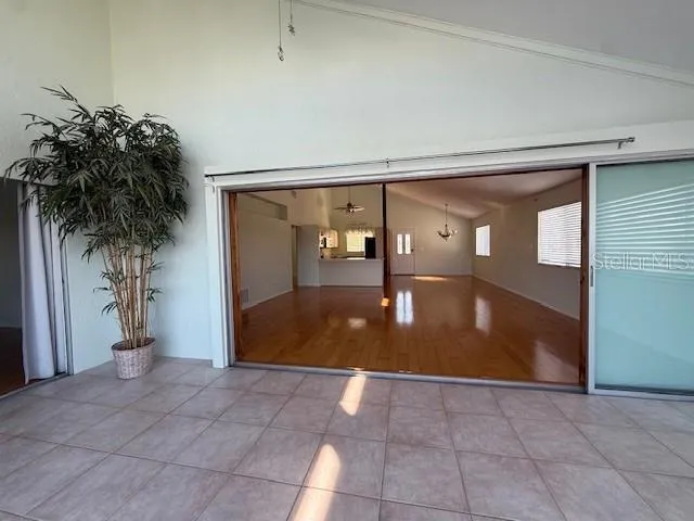 a kitchen with cabinets window and stainless steel appliances