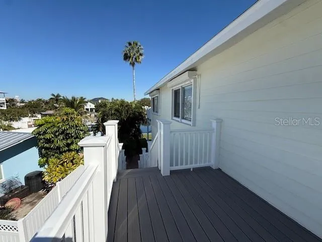 a view of a backyard of the house