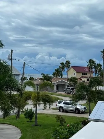 a street sign on a brick wall