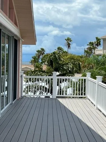 a kitchen with stainless steel appliances a refrigerator and a stove top oven
