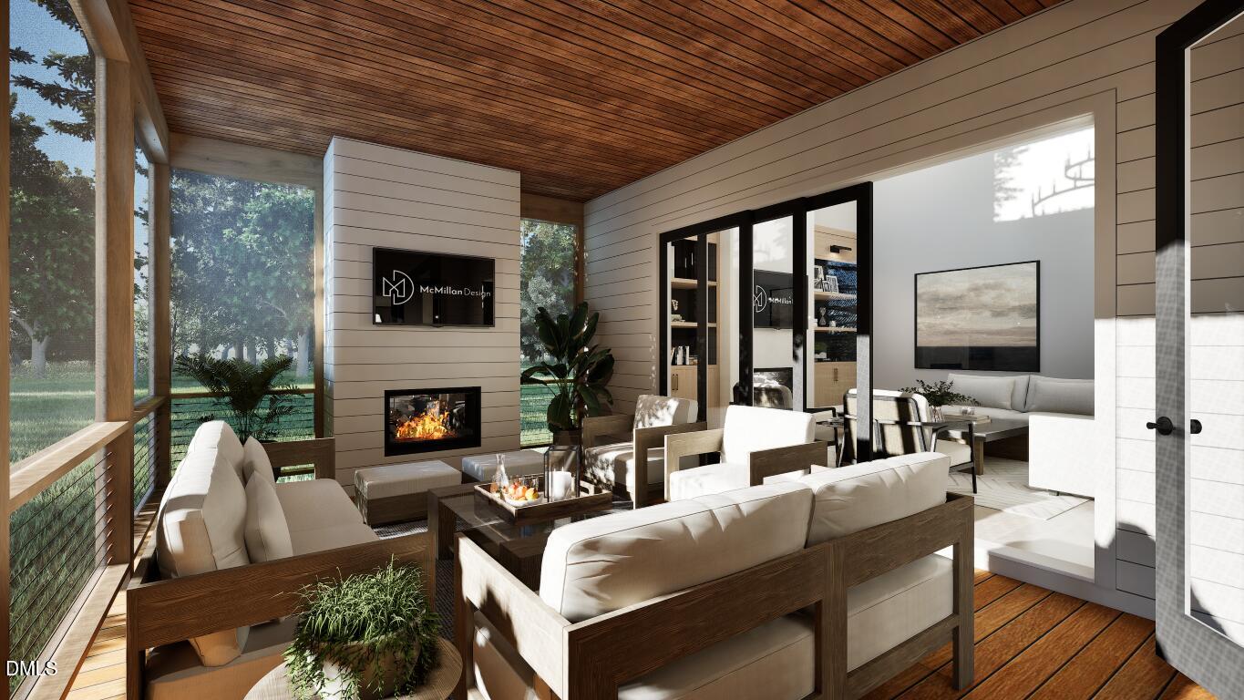 7613 Thompson Mill Road Wake Forest, NC 27587 - Photo 17 of 20 a living room with fireplace furniture and a large window