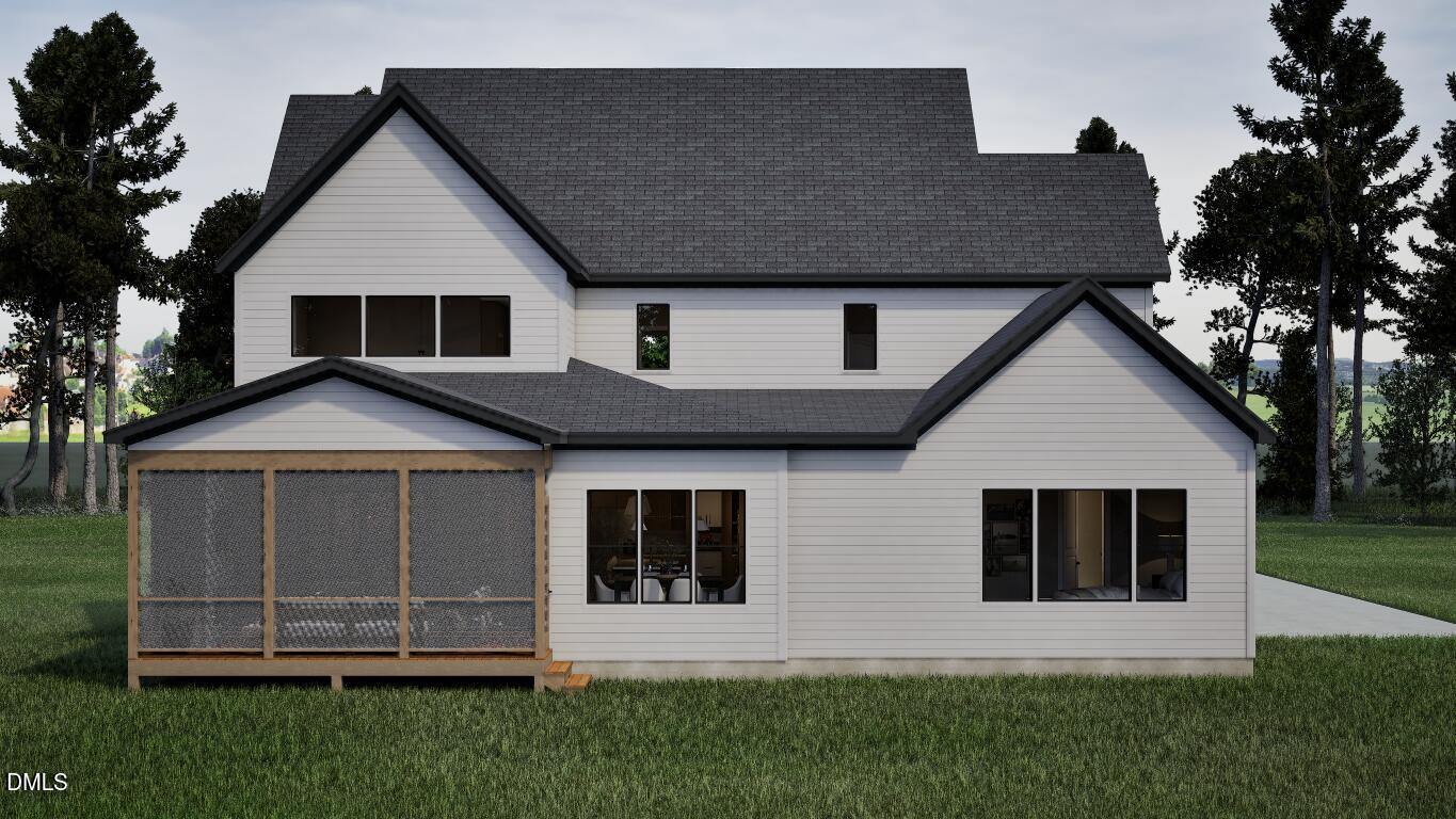 7613 Thompson Mill Road Wake Forest, NC 27587 - Photo 18 of 20 a front view of a house with a yard and garage